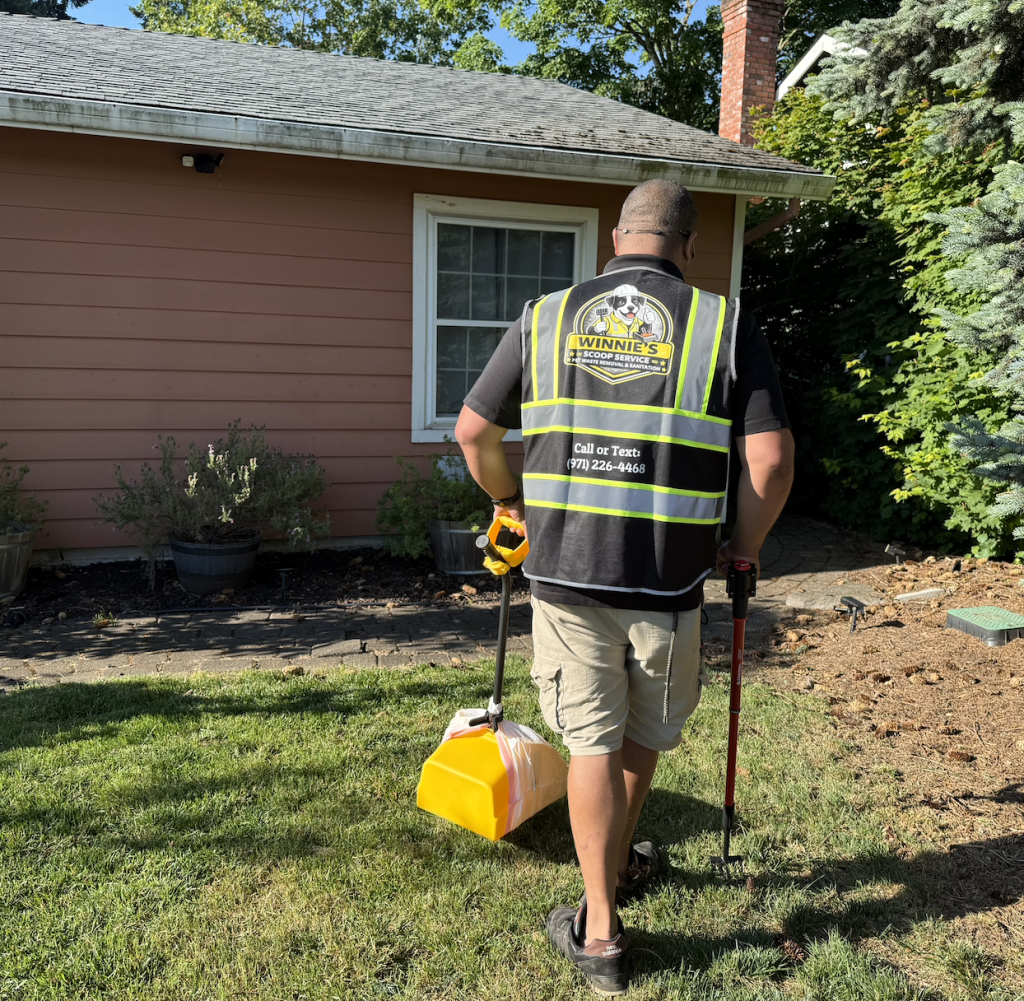 Professional pet waste removal service performing yard cleanup in Beaverton Oregon